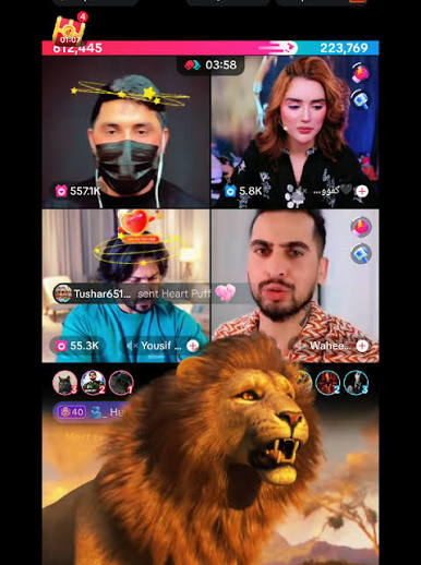 TikTok-LIVE mit vier Creatorn, virtuellen Geschenken, Zuschauerzahlen und einem großen Löwen als Animation im Vordergrund.